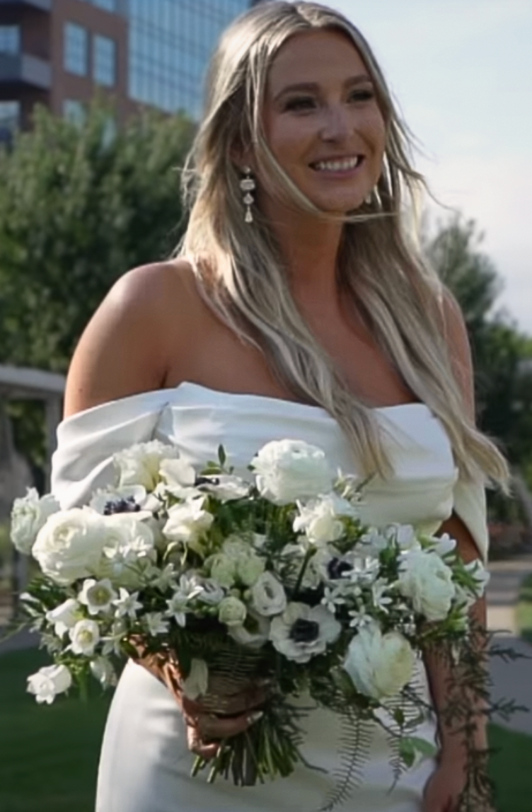 Bridal bouquet with white campanula, triteleia, seastar fern