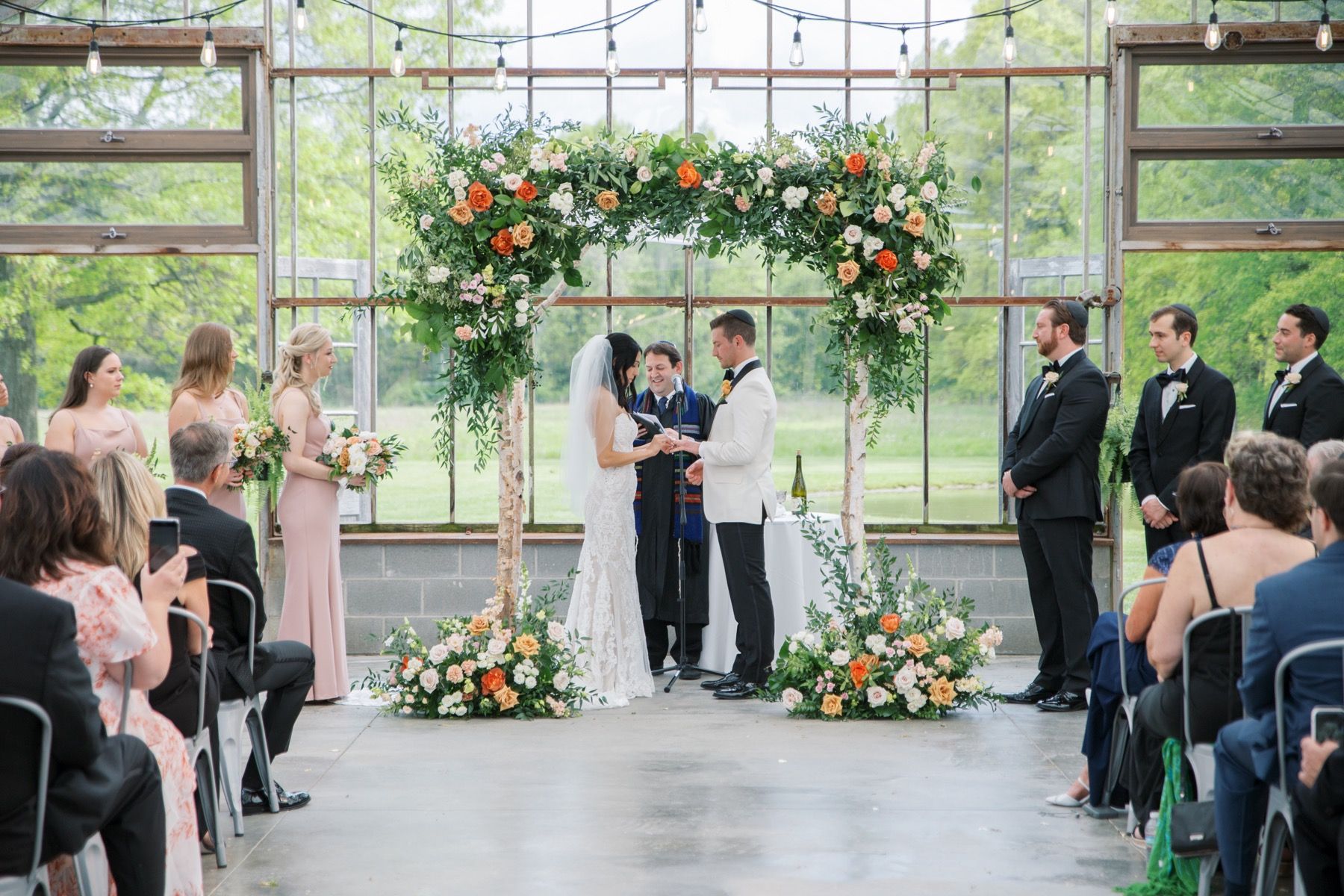 orange toned wedding arch florist columbus ohio 