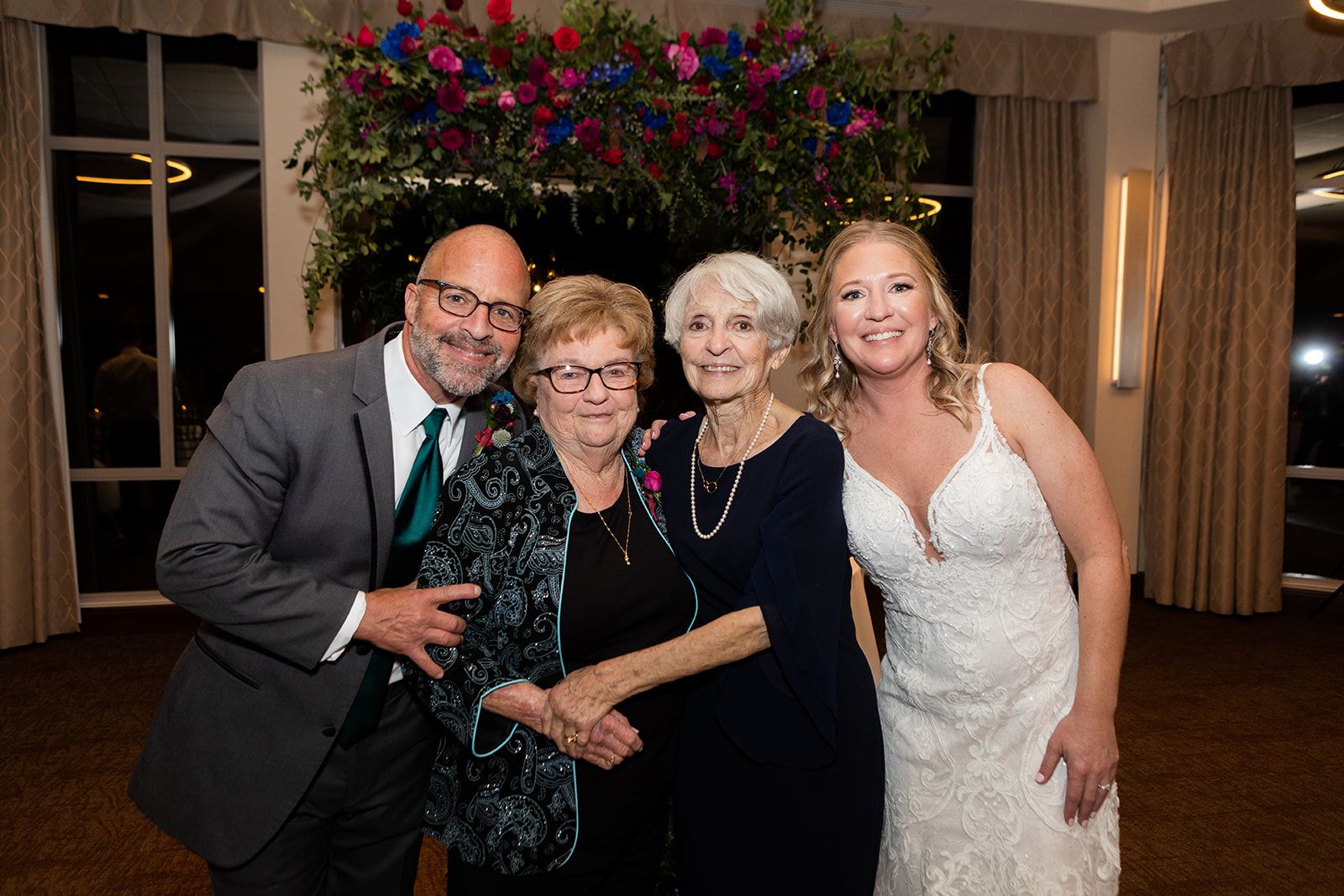 jewel toned wedding flowers with guests