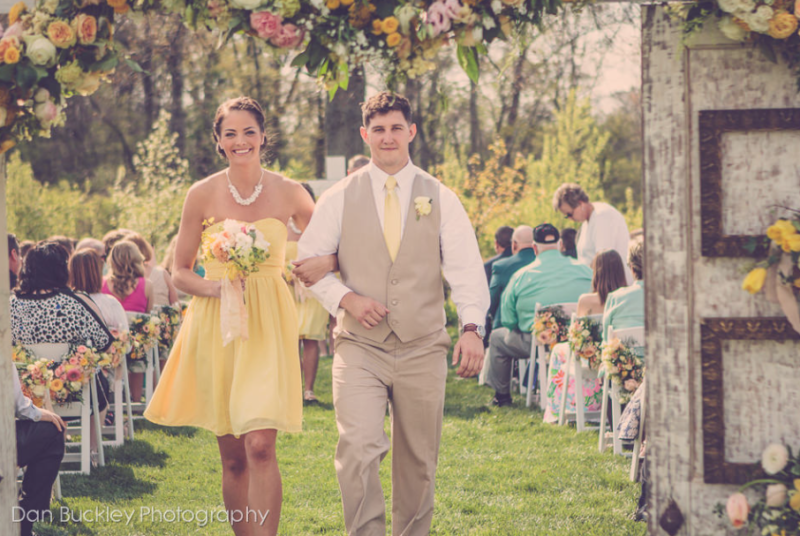 yellow and white bridesmaid bouquet with hints of pink