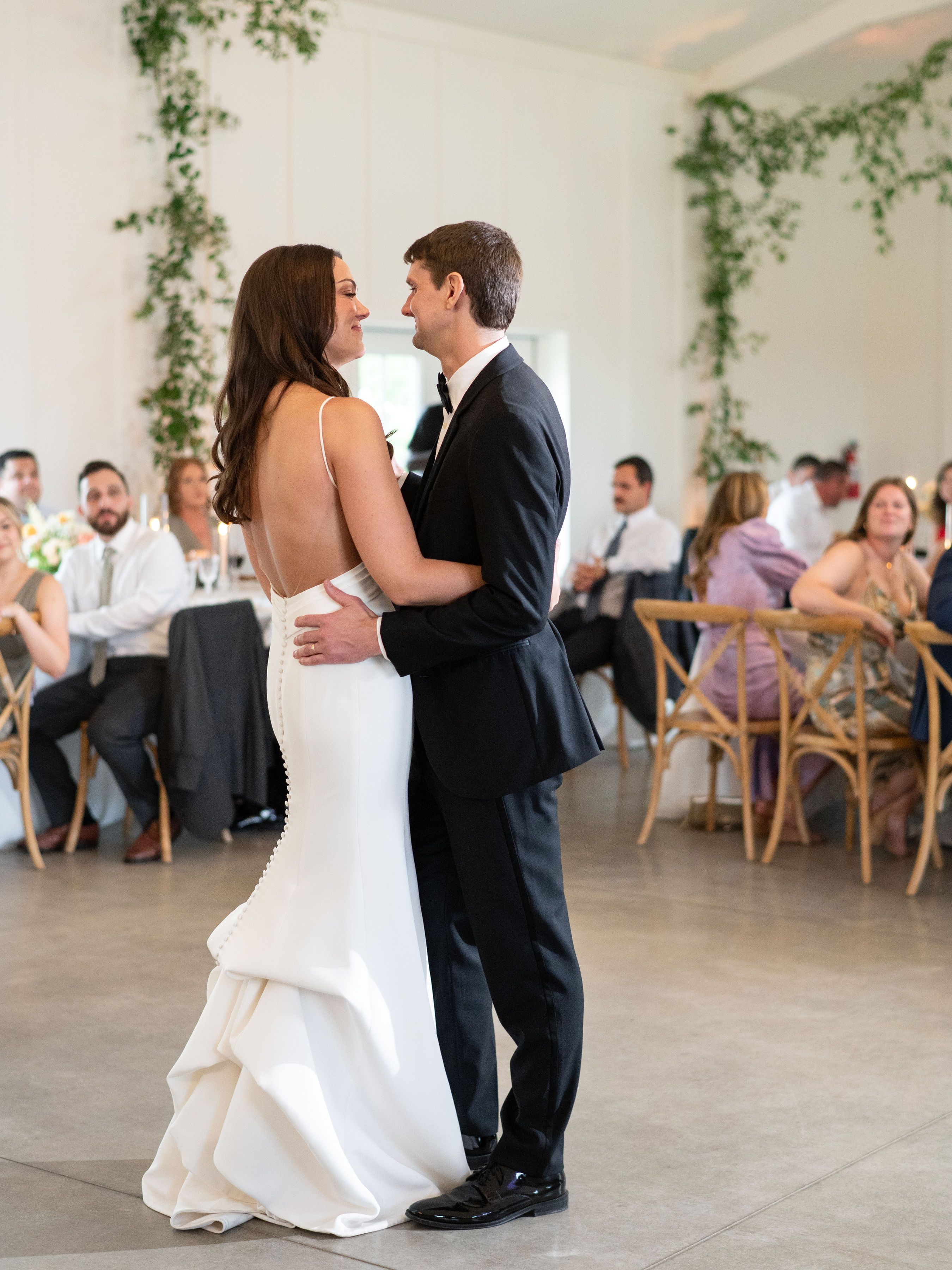 couple dancing greenery draping