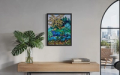 colorful painting of trees and bushes surrounding a pond against an urban apartment wall