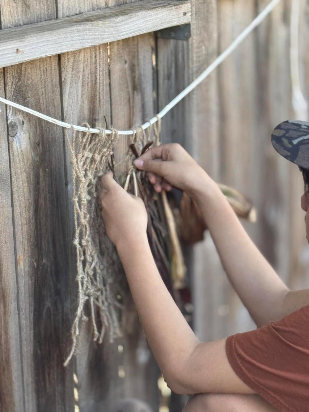 Youth crafting with natural fibers