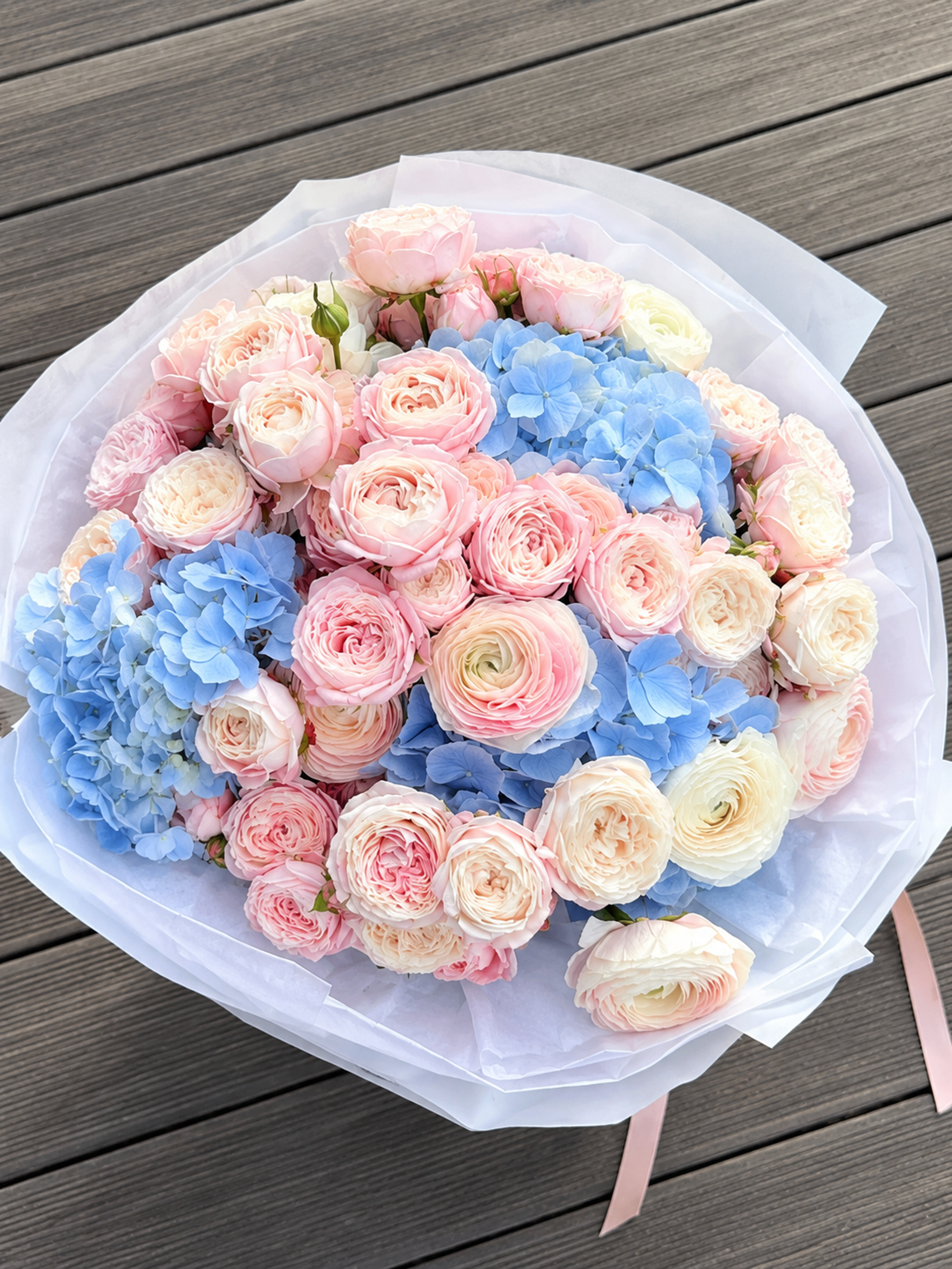 Peony roses with hydrangea
