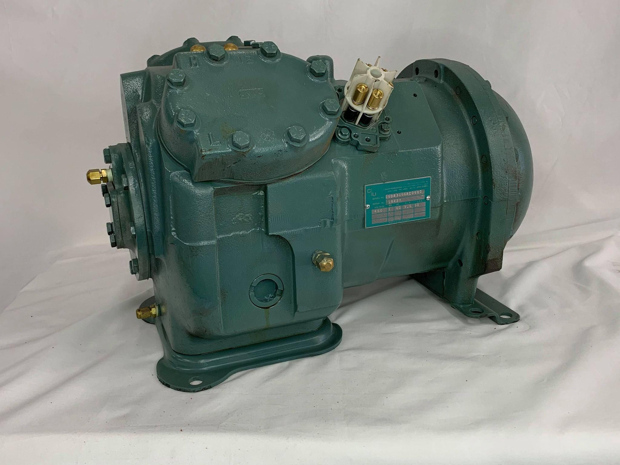 Remanufactured Carrier 06D316 semi-hermetic reciprocating compressor with nameplate details.