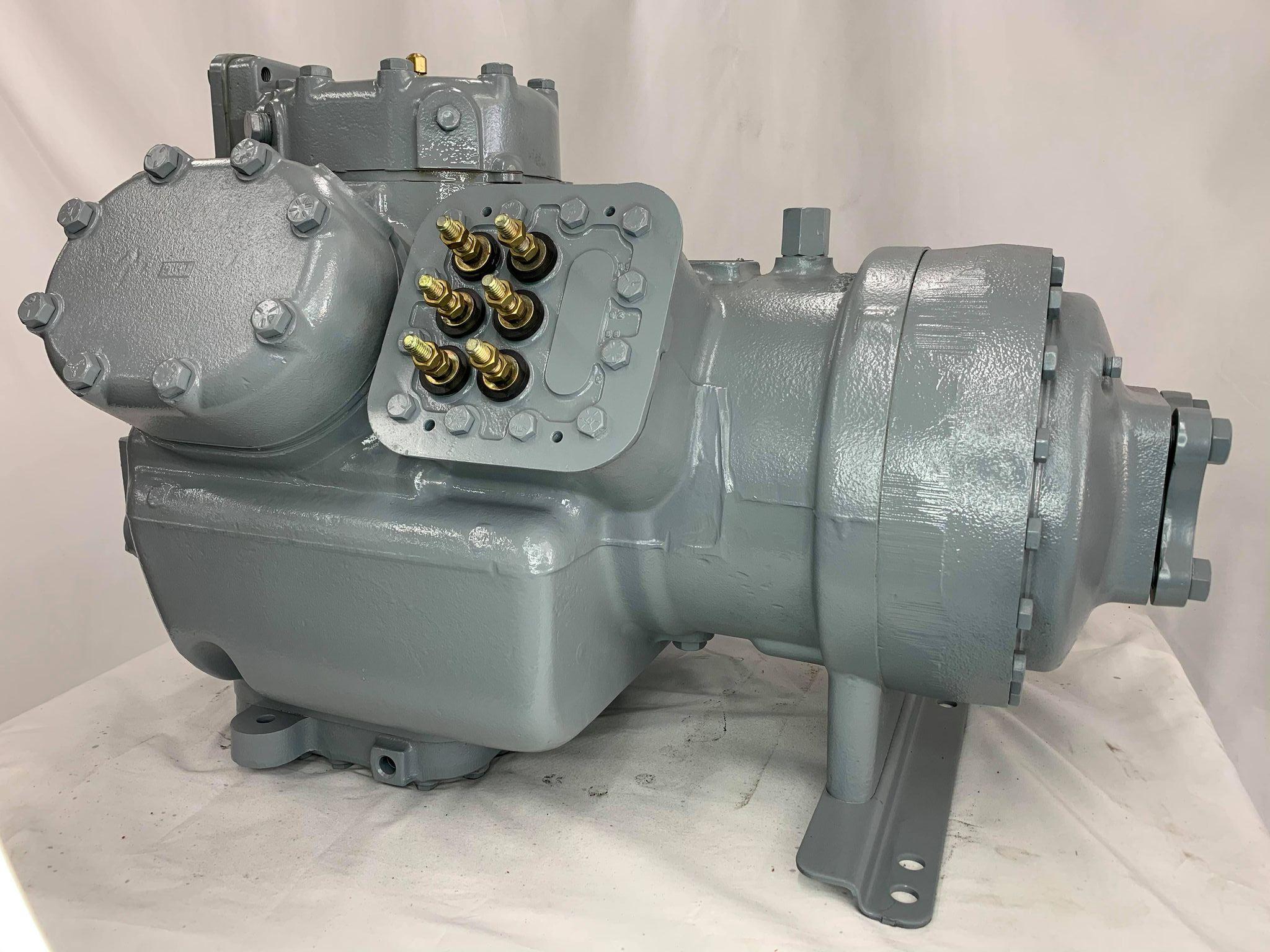 Remanufactured Carrier 06E semi-hermetic reciprocating compressor with pipes and mounting brackets