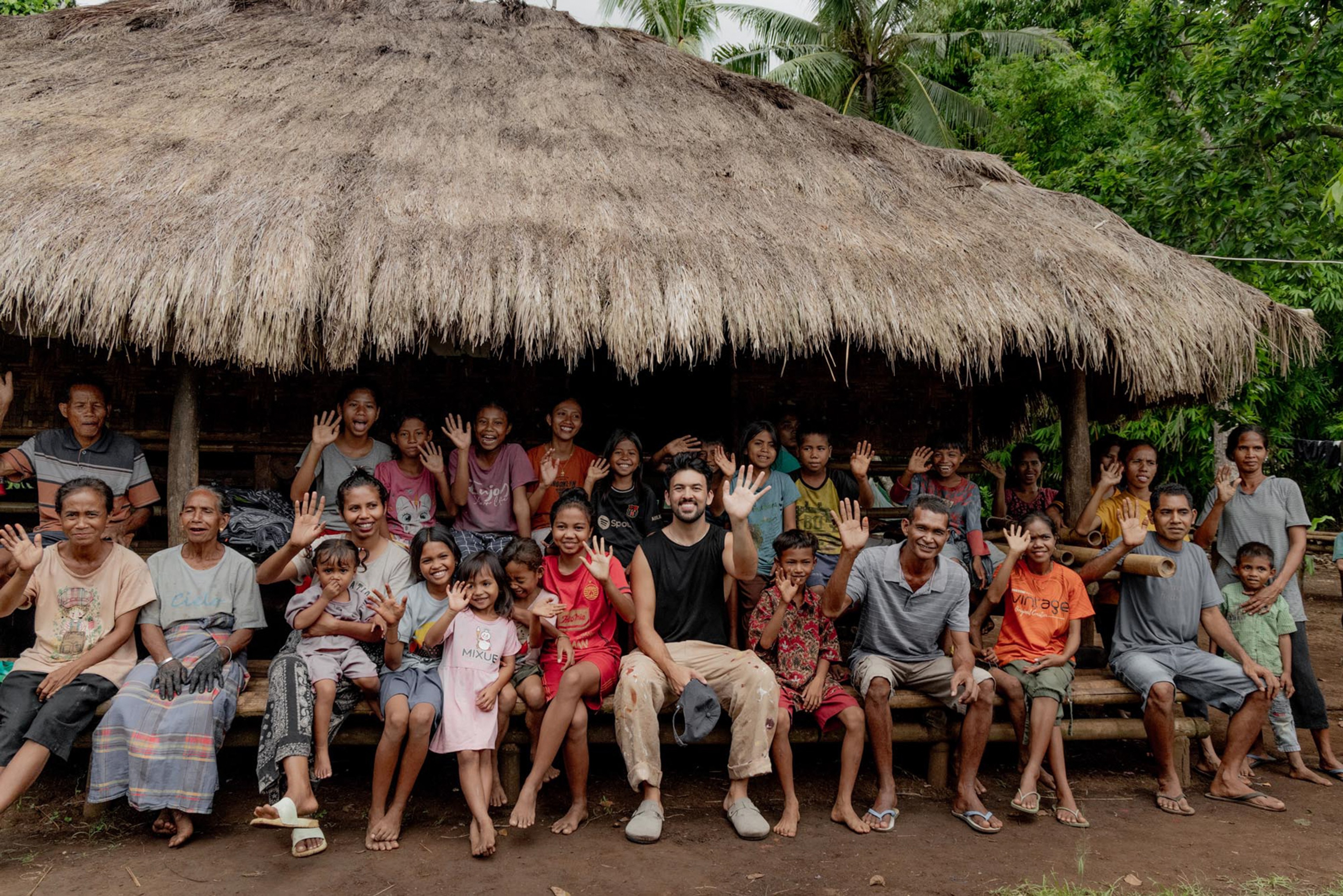 Jake Paul White with local Sumbanese community at Cap Karoso Image