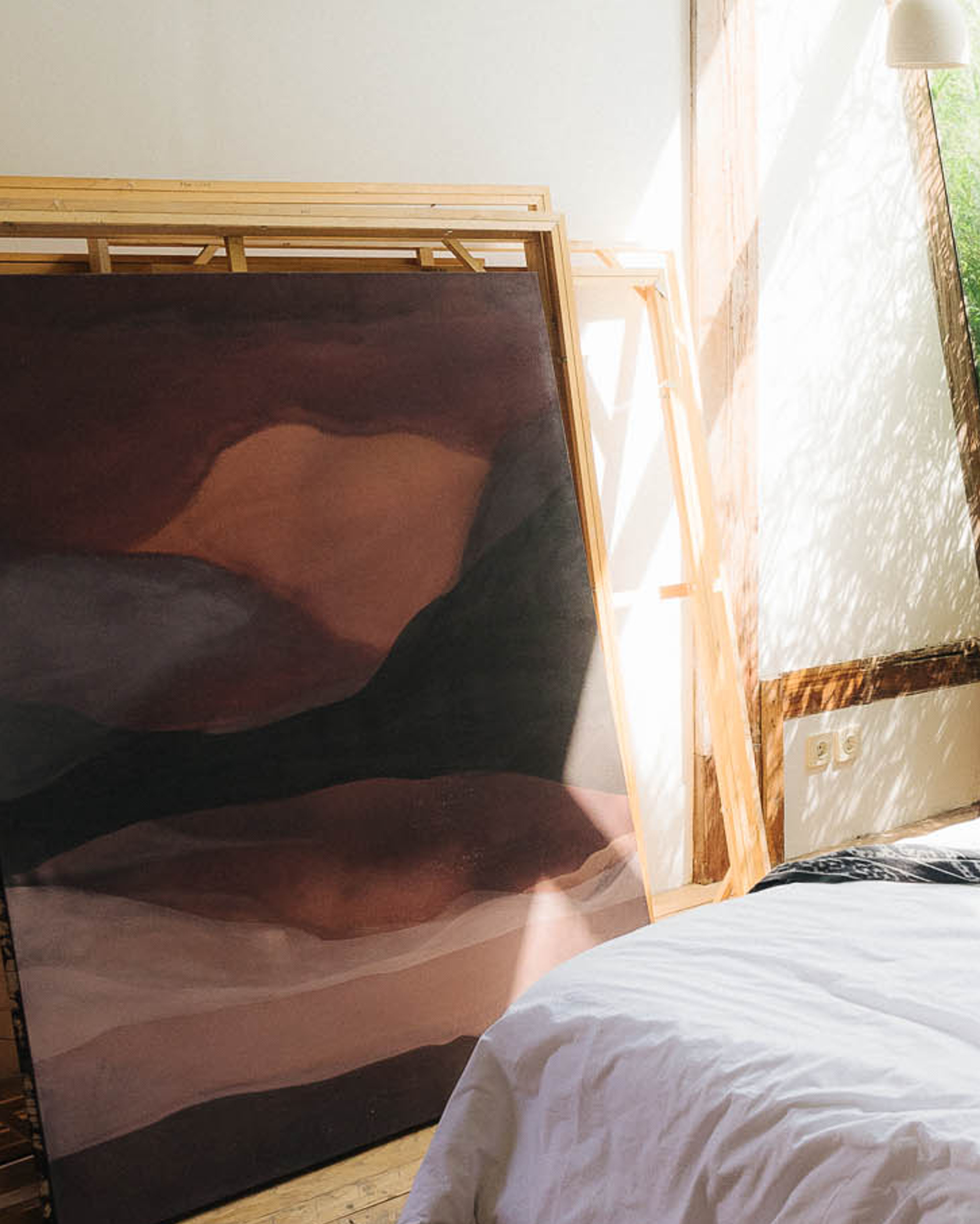 Abstract painting "Crimson Portal" by Jake Paul White from the Red Series, created with Indonesian tea, coconut husk dye, clay, and rock pigments in 2024.