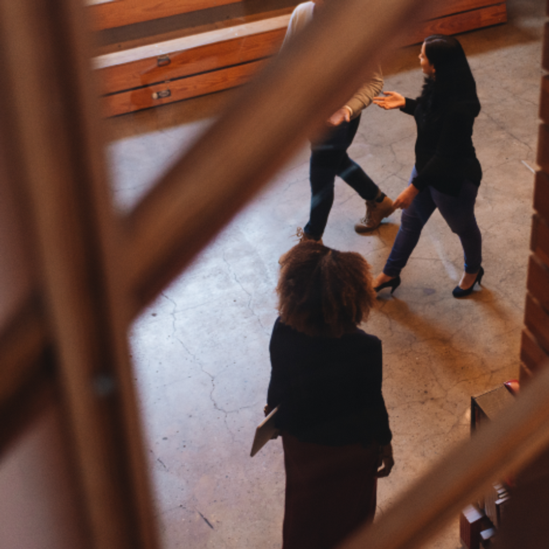 Women walking through a hallway