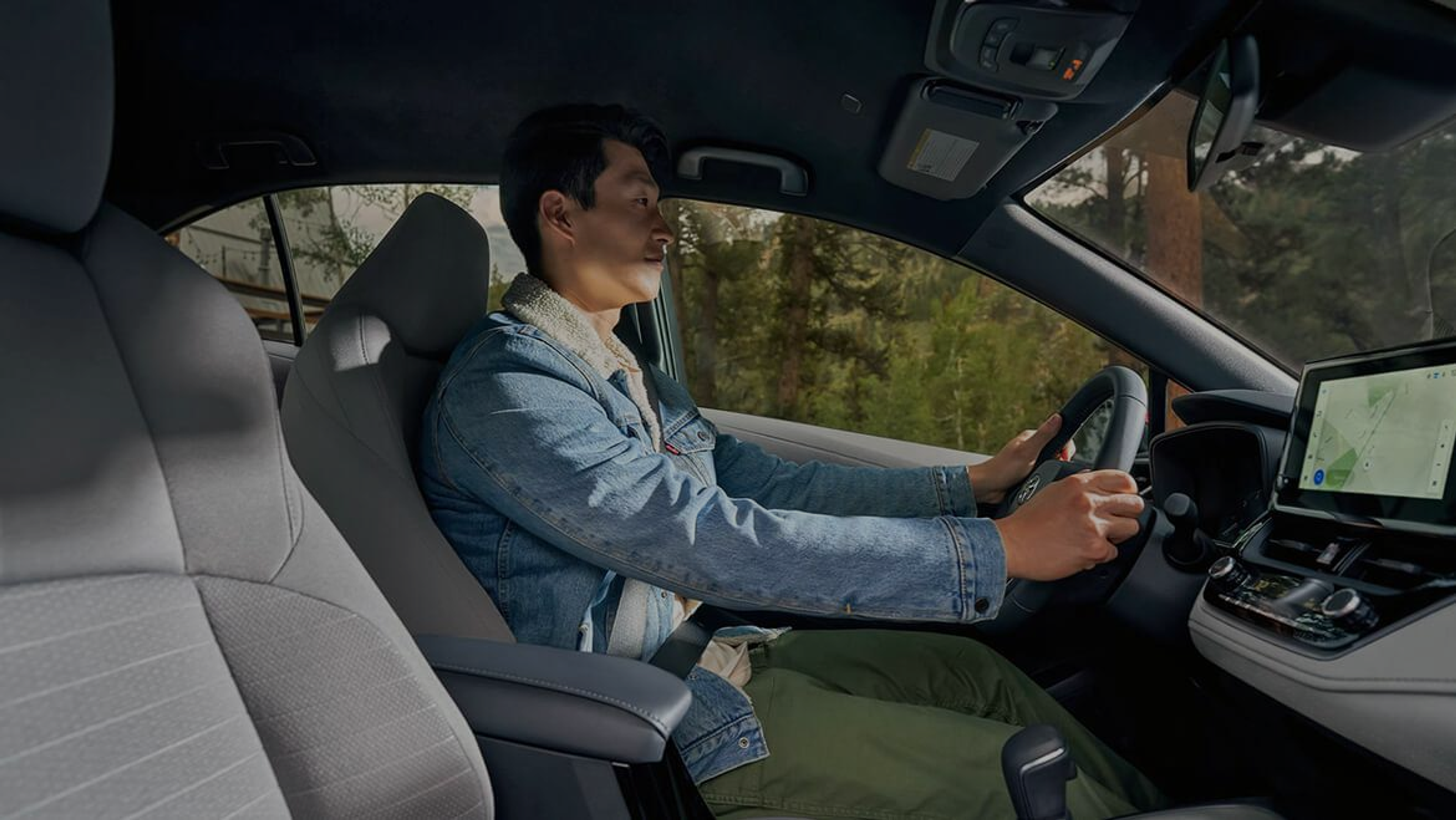 Man driving a Toyota vehicle