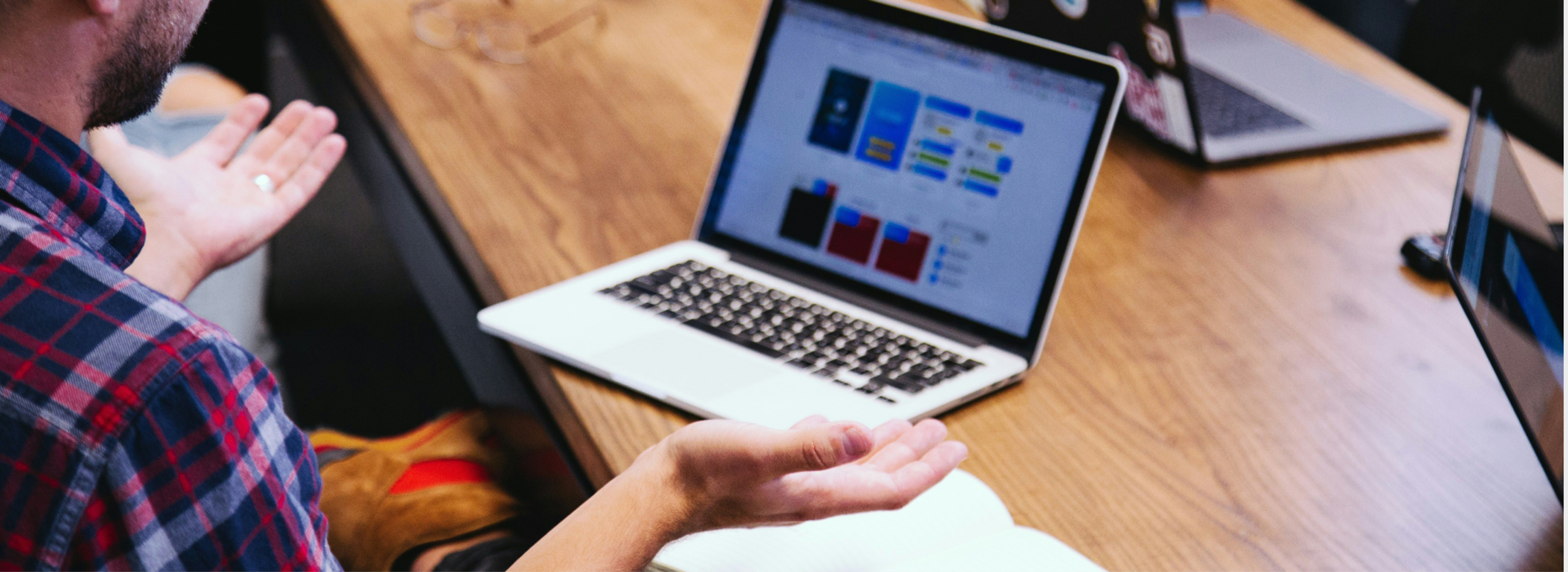 Person using a laptop at a desk