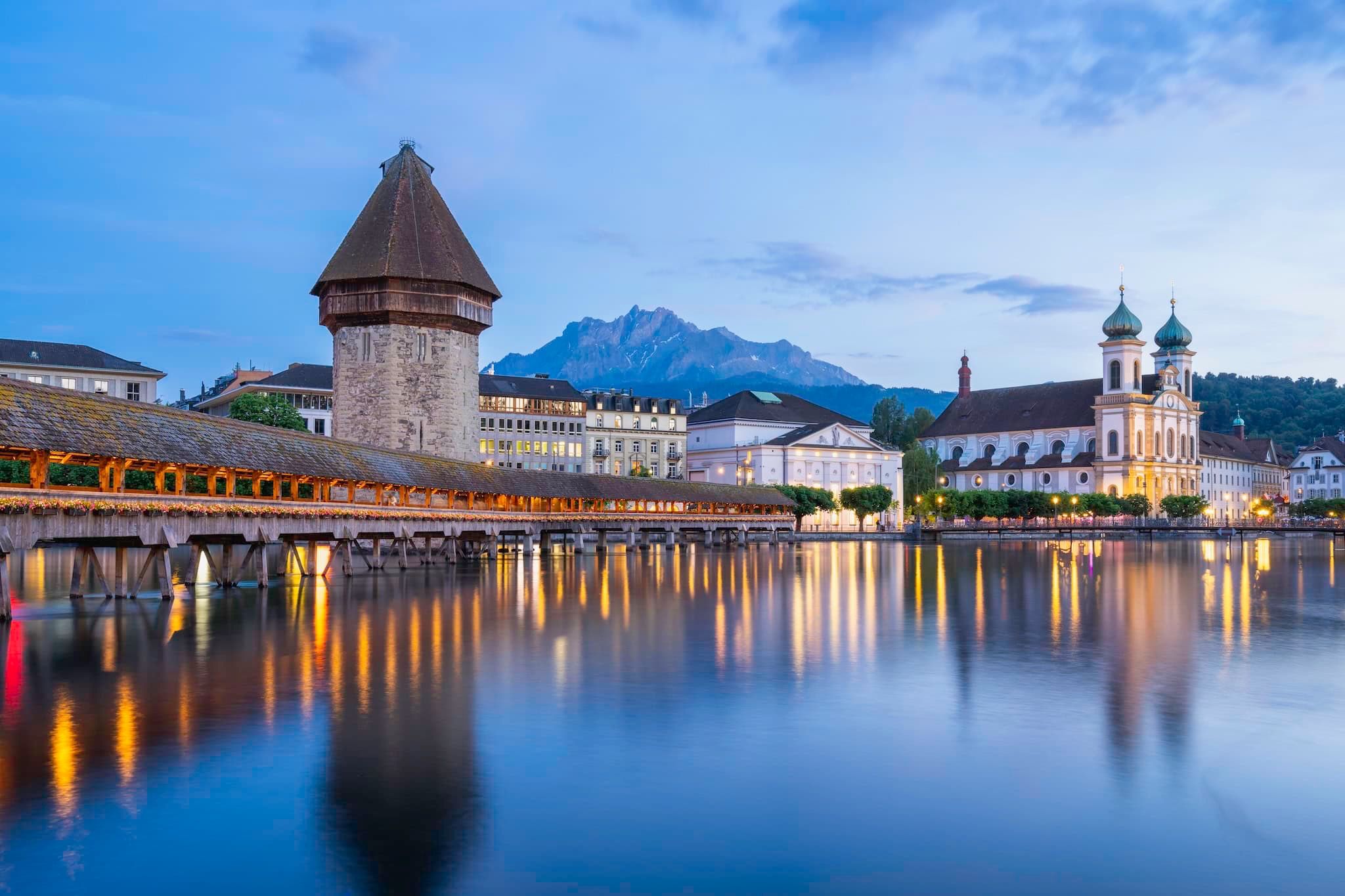 September: The Chapel Bridge and Water Tower on the Reuss at dusk, Lucerne, Switzerland