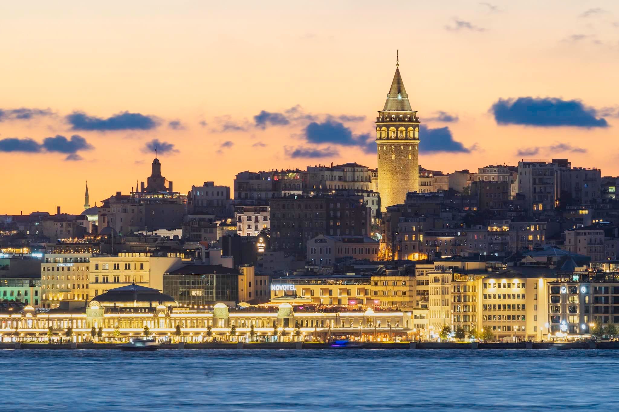 March: The Galata Tower above the waterfront at sunset, Istanbul, Türkiye