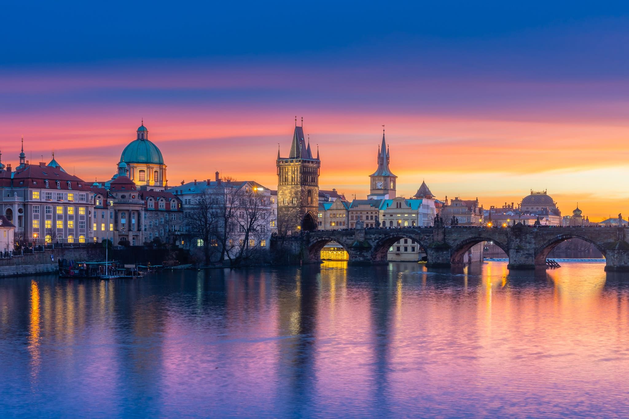 Charles Bridge and Old Town Bridge Tower at sunset, Prague, Czech Republic