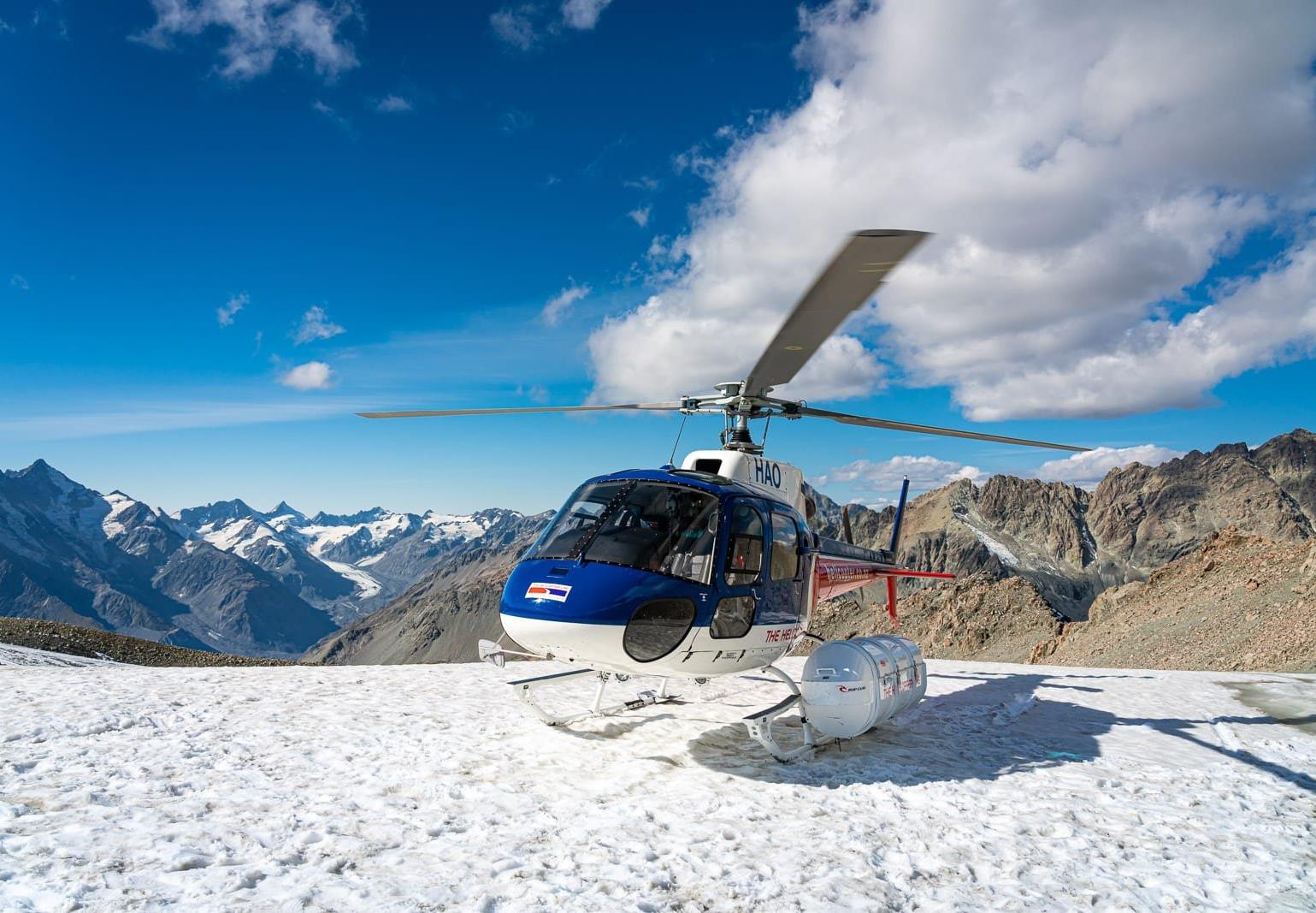 Our helicopter during snow landing, Aoraki / Mount Cook National Park, South Island, New Zealand