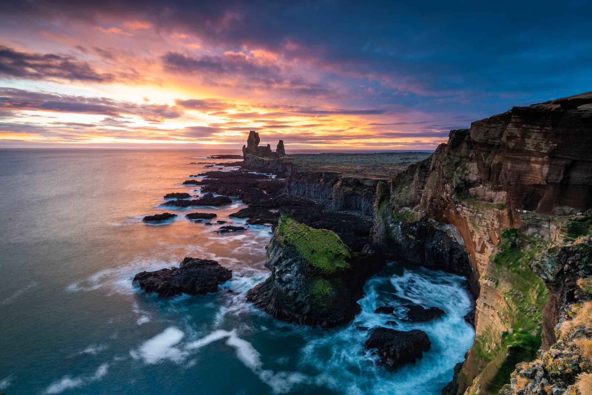 Londrangar rock formations and cliffs at sunset, Iceland