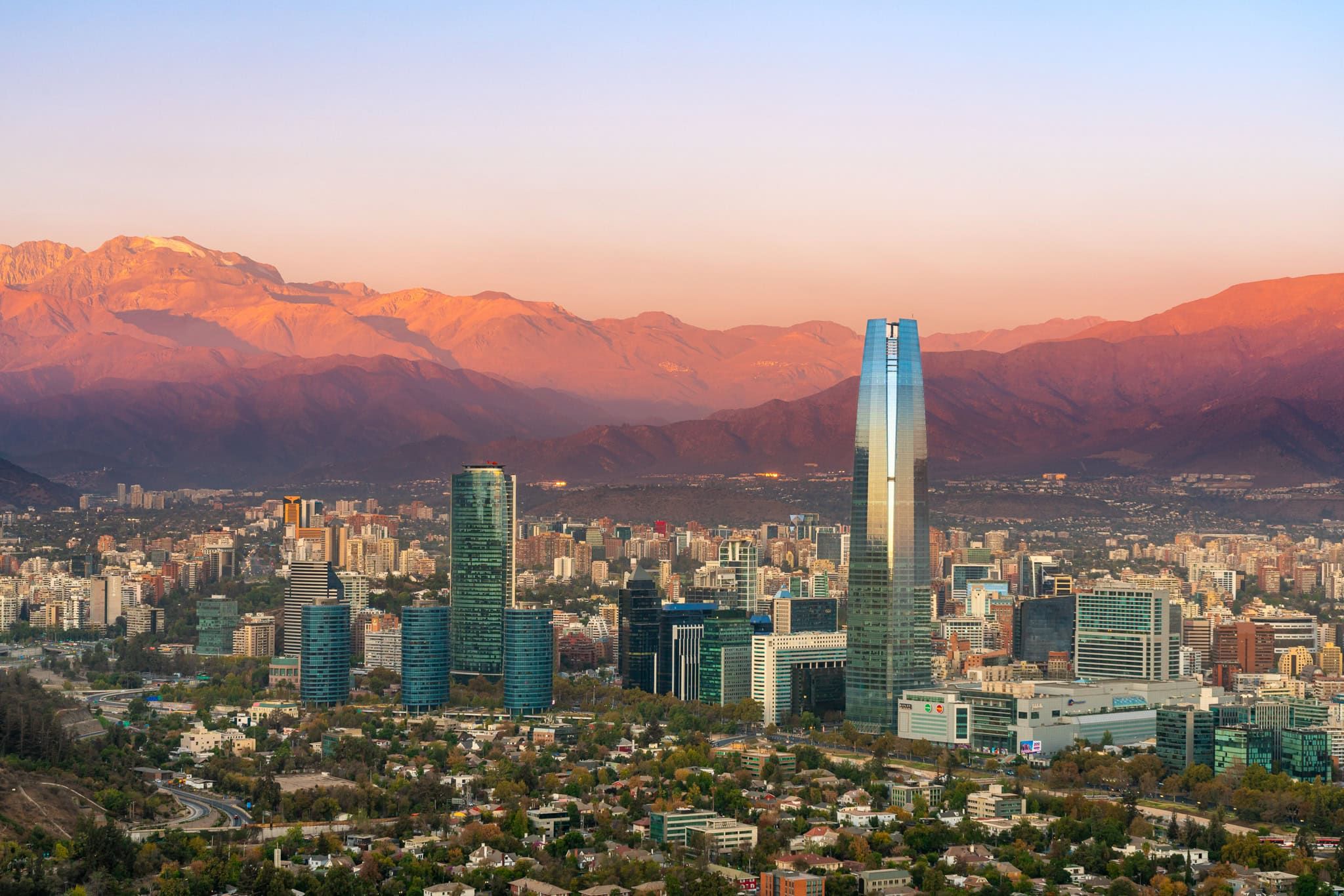 Gran Torre Santiago with Andes Mountains at sunset, Santiago, Chile