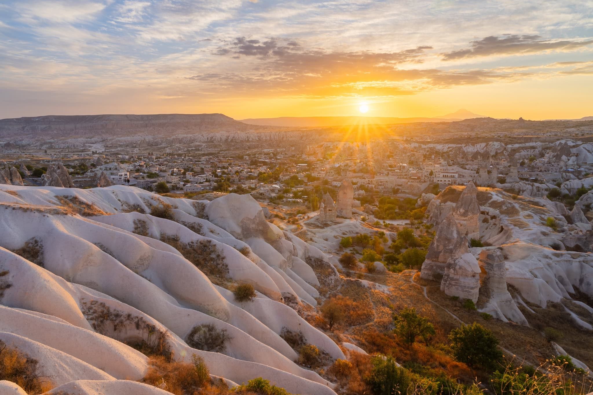 Göreme fairy chimneys and town at sunrise, Cappadocia, Turkey
