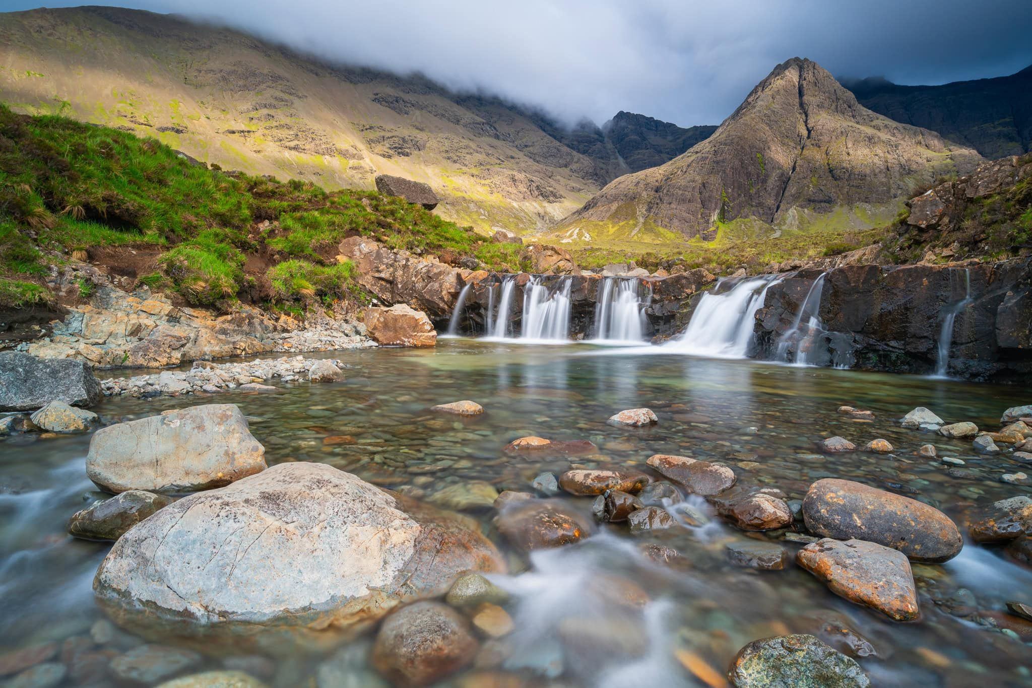 Waterfall cascade and stream at Fairy Pools, Isle of Skye, Scottish Highlands, Scotland