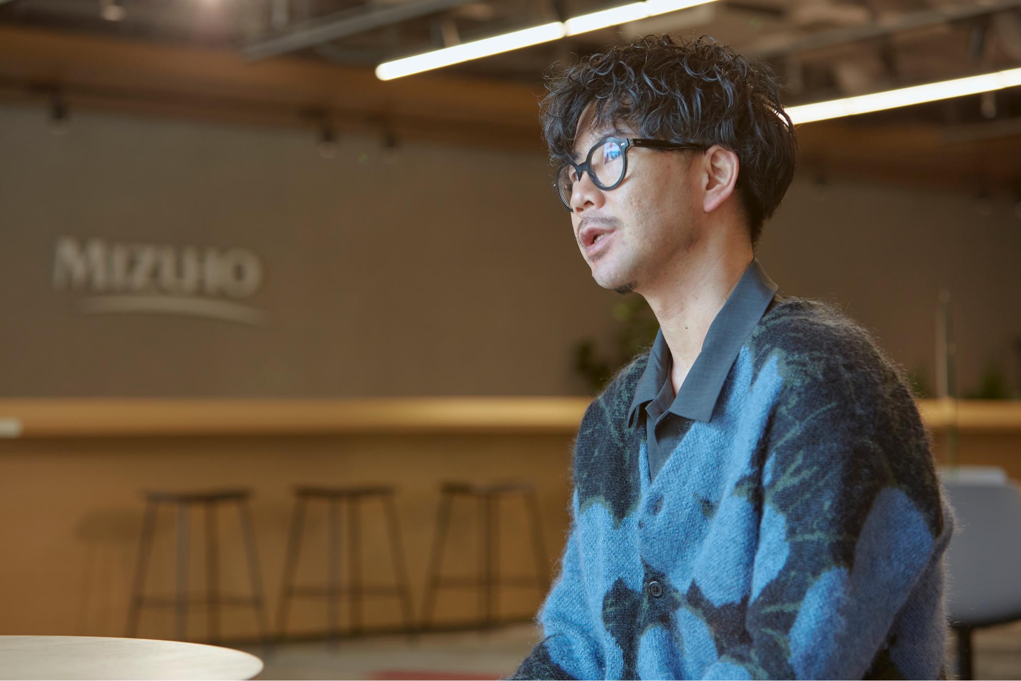 Akinori speaking