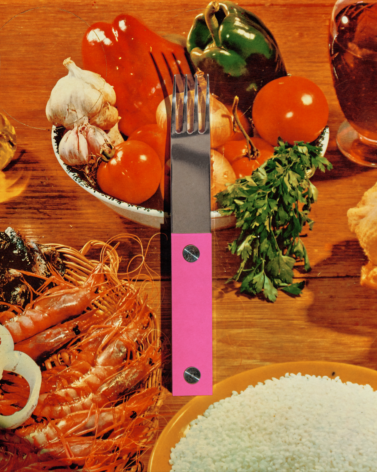 Bright pink-handled fork centered over vibrant collage of vegetables, seafood, herbs, and rice ingredients.