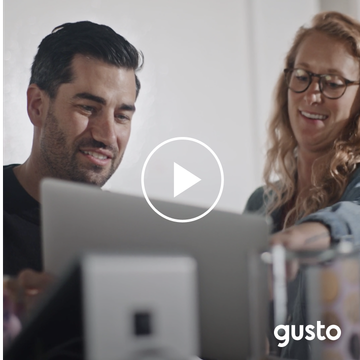 Image of Gusto employees with video overlay on click