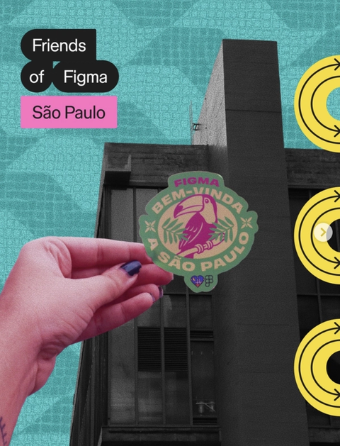 A graphic features a hand holding a colorful toucan sticker