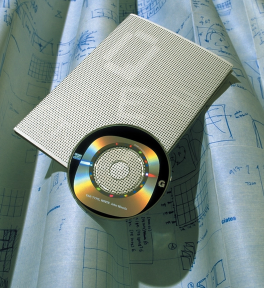 CD ROM and program sitting on a printed blueprint