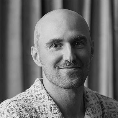 Black and white headshot of Ryan Smith