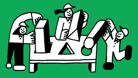 An illustration of three people fitting geometric prisms through corresponding holes on a table.