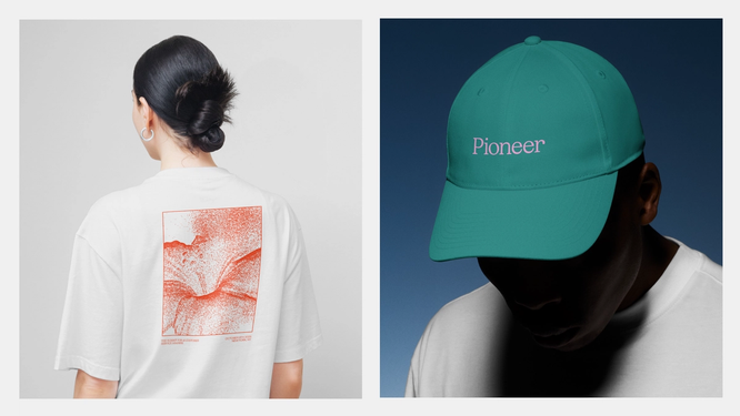 A white T-shirt and green cap sport a red flower design and purple text.