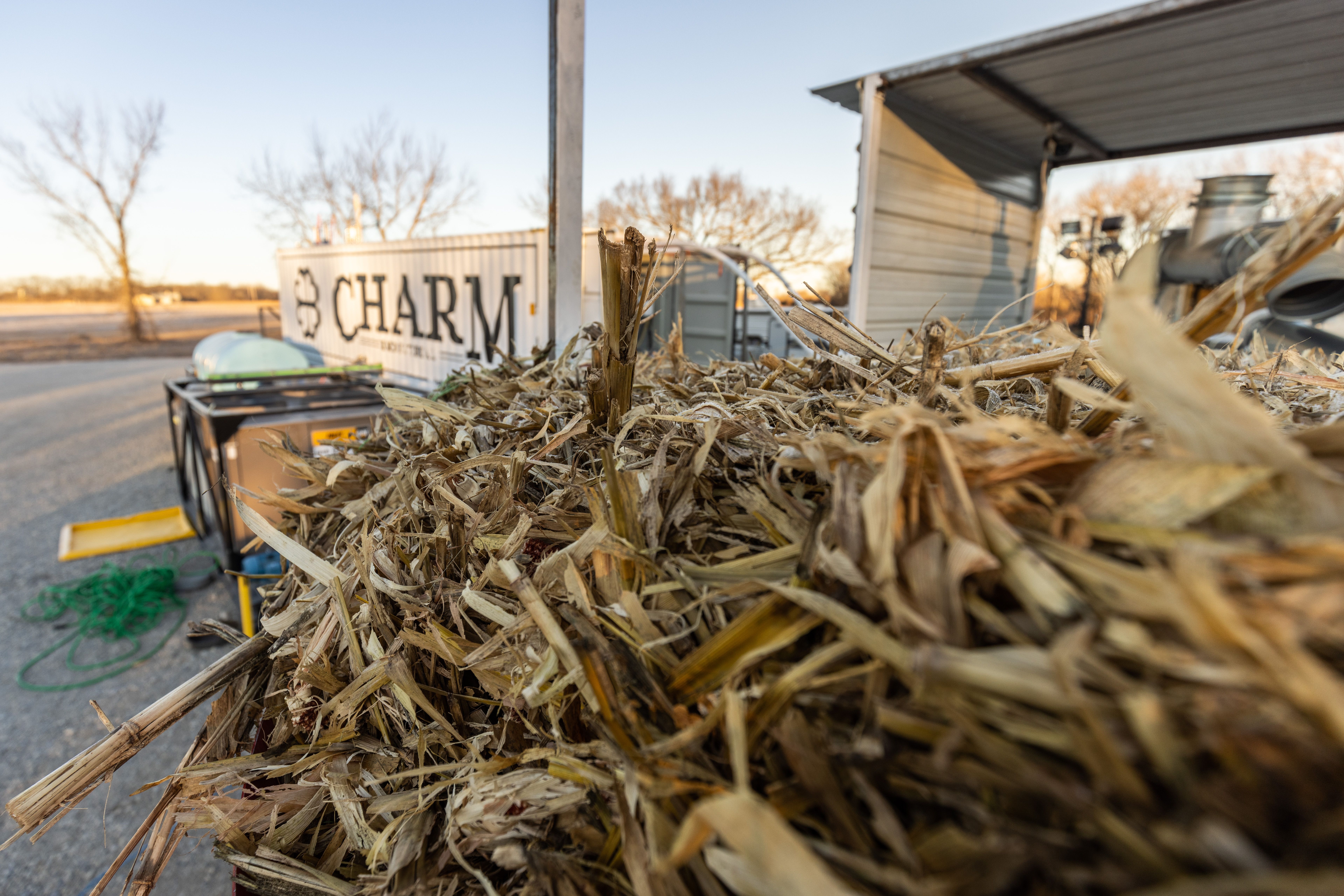 A pyrolysis machine processes corn stover, the inedible parts of corn, on a farm in Kansas.