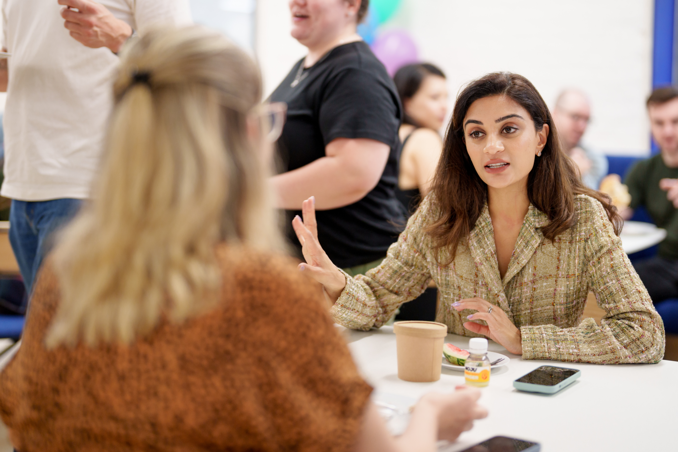 Woman having a conversation at a table
