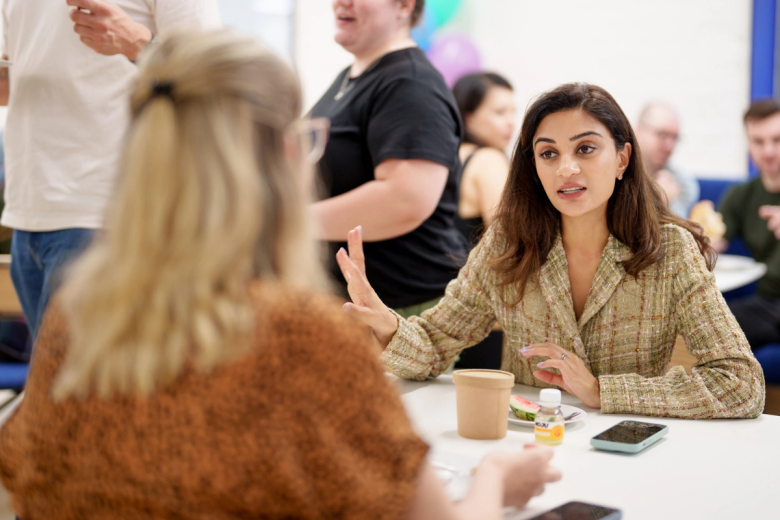 Woman having a conversation at a table