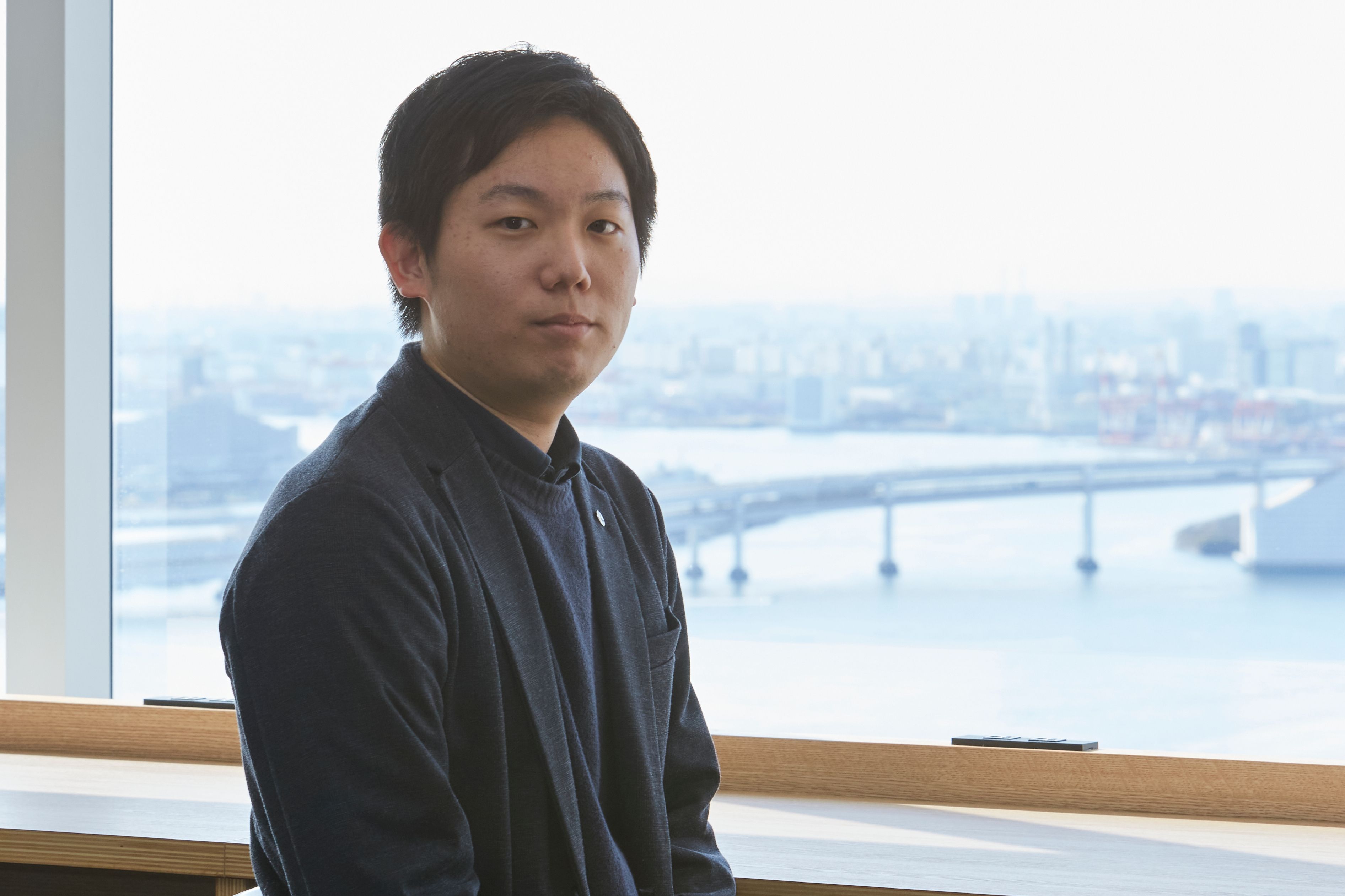 エンジニア兼デザイナーとして活躍する堤氏