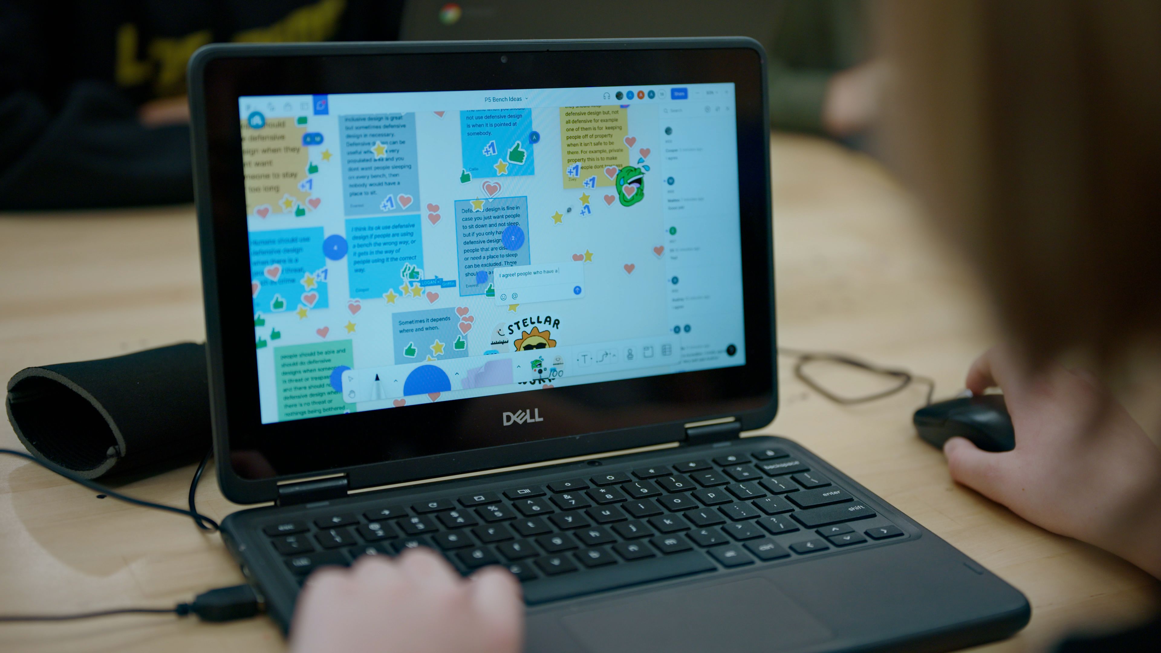 A student works on their laptop