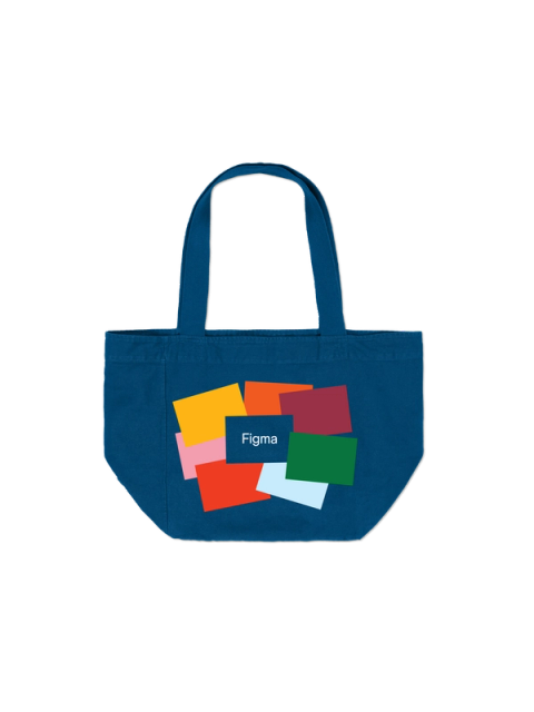 Colorful overlapping rectangles with the Figma logo printed on a navy tote bag