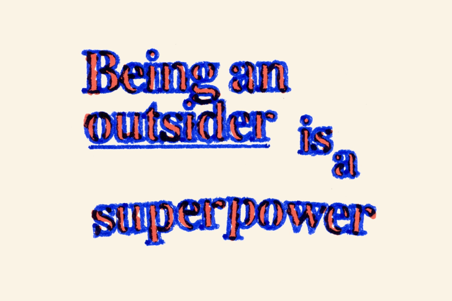 Stylized text reading “Being an outsider is a superpower” in a bold, serif typeface. The text is red with a blue outline, giving it a rough, print-like texture. The words are arranged in a staggered, engaging format on a light beige background.
