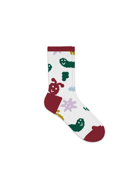 Colorful abstract creatures with smiling faces scattered across a white sock with maroon heel and toe