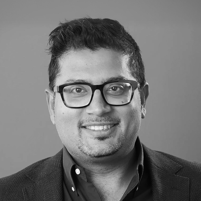 Black and white headshot of Vishal Kapoor