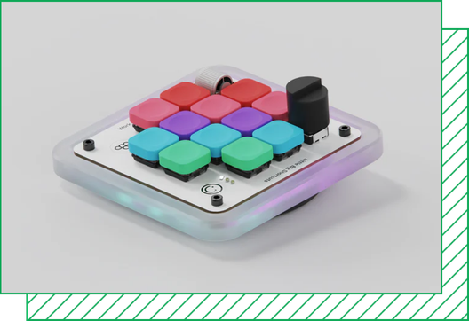 A photo of the Figma Creator Micro showcases the mechanical keyboard’s translucent square frame and colorful keycaps.