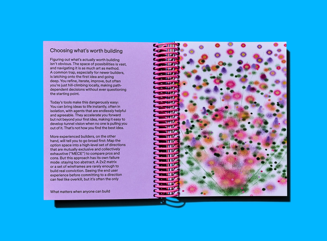 Open notebook pairs an article about choosing worthwhile ideas with a dreamy abstract floral illustration.