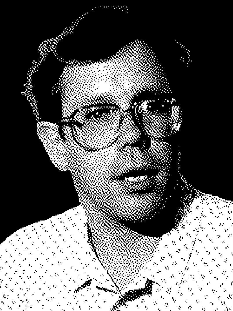 眼鏡をかけた男性、Bill Atkinsonと識別される人物が、襟付きのシャツを着て、少し横を向いている、白黒のハーフトーン調の写真。