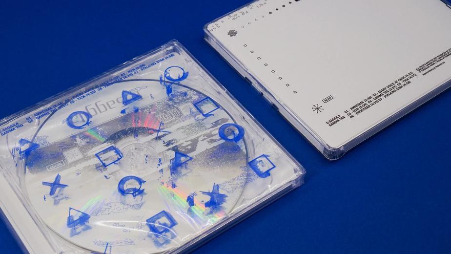A photo of blue images printed on a clear plastic CD case