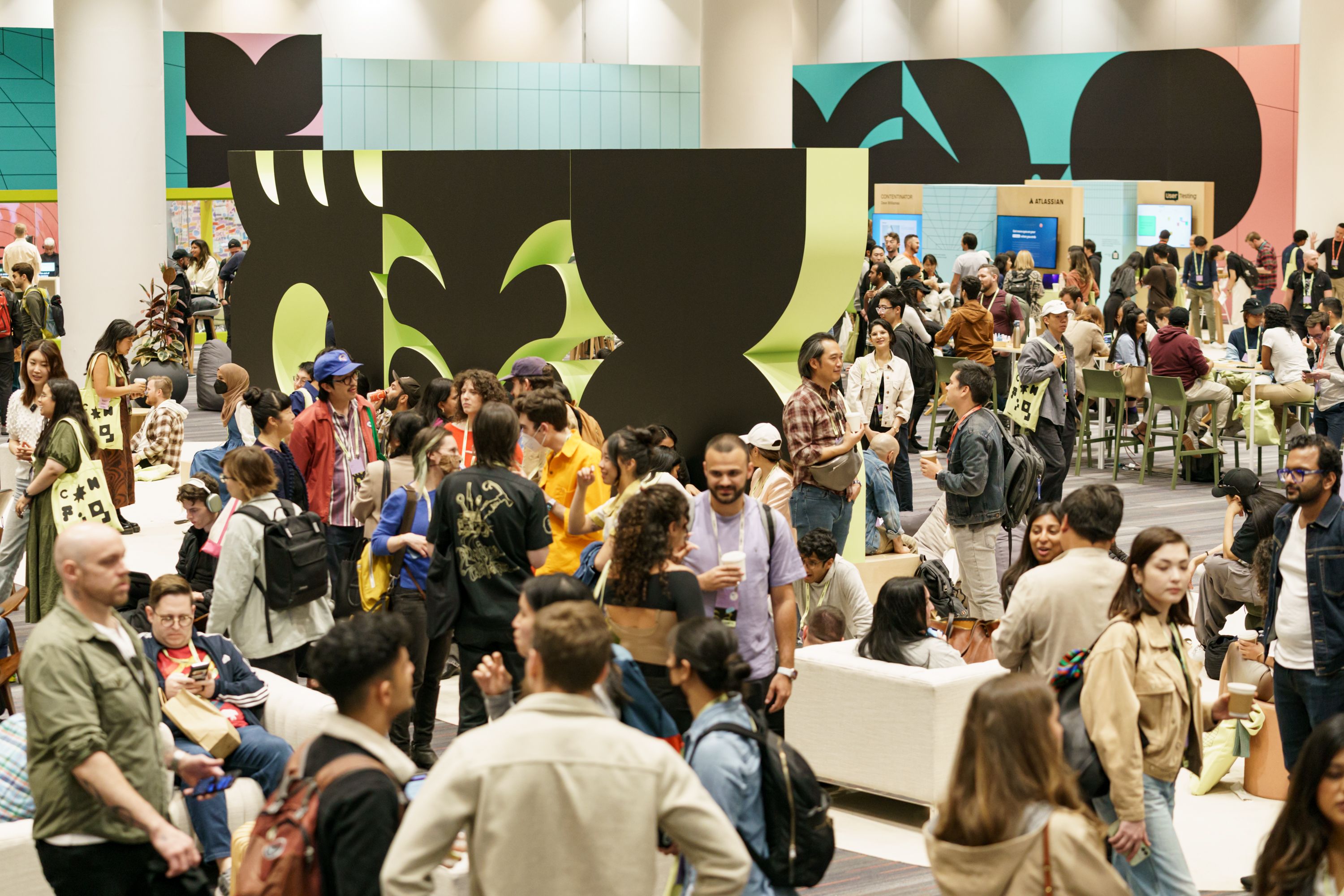 A photo showing attendees on the conference floor of Moscone at Config 2023.