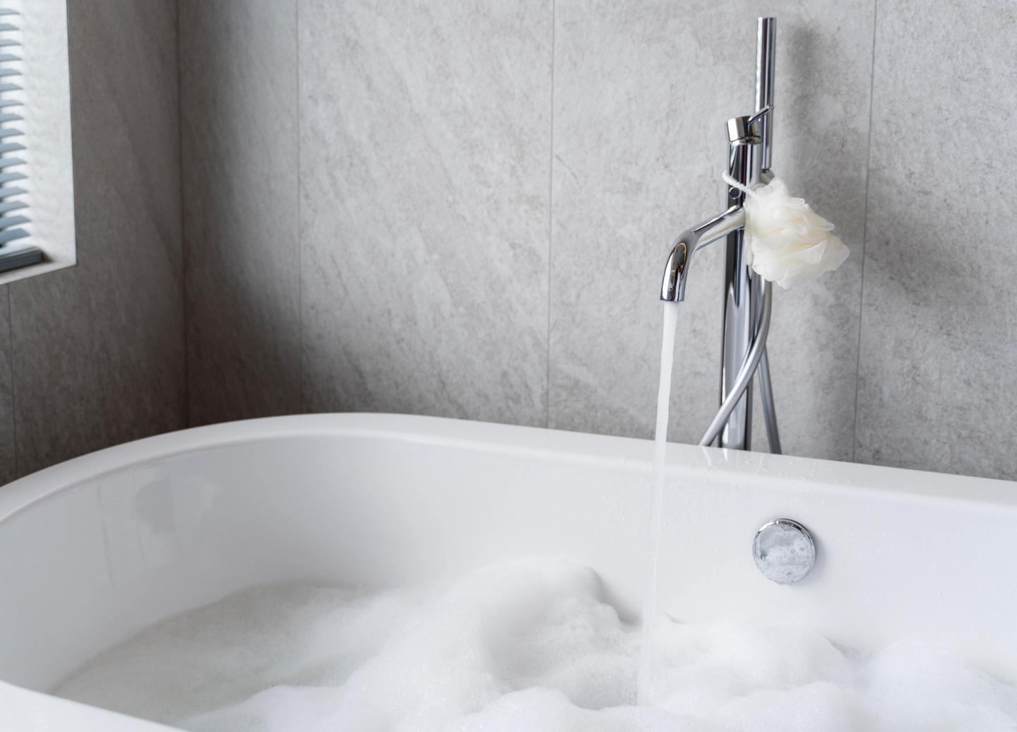 bath filled with water and foam
