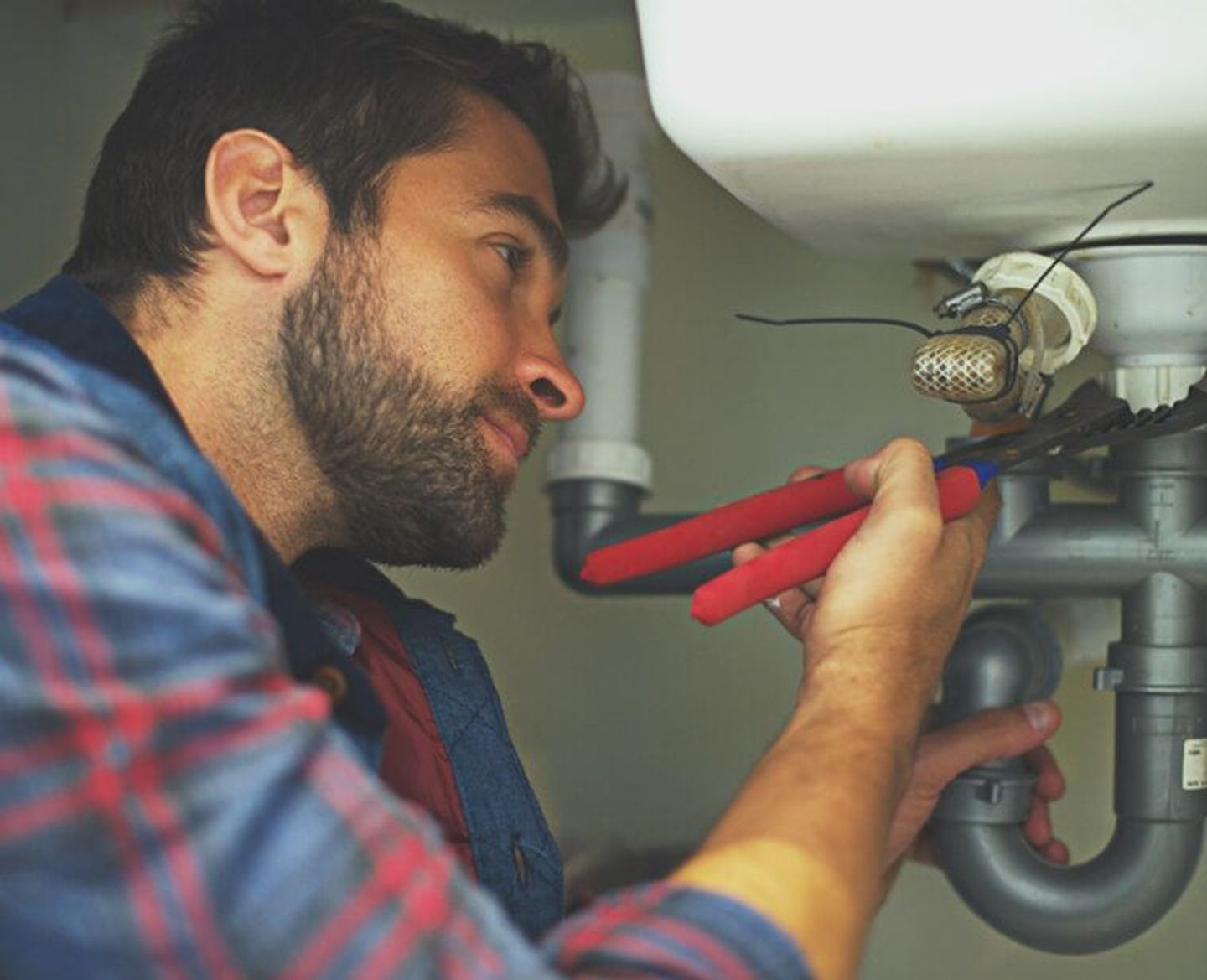 fixing piping under the sink