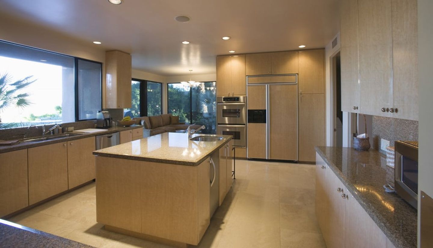 a spacious kitchen with a kitchen island