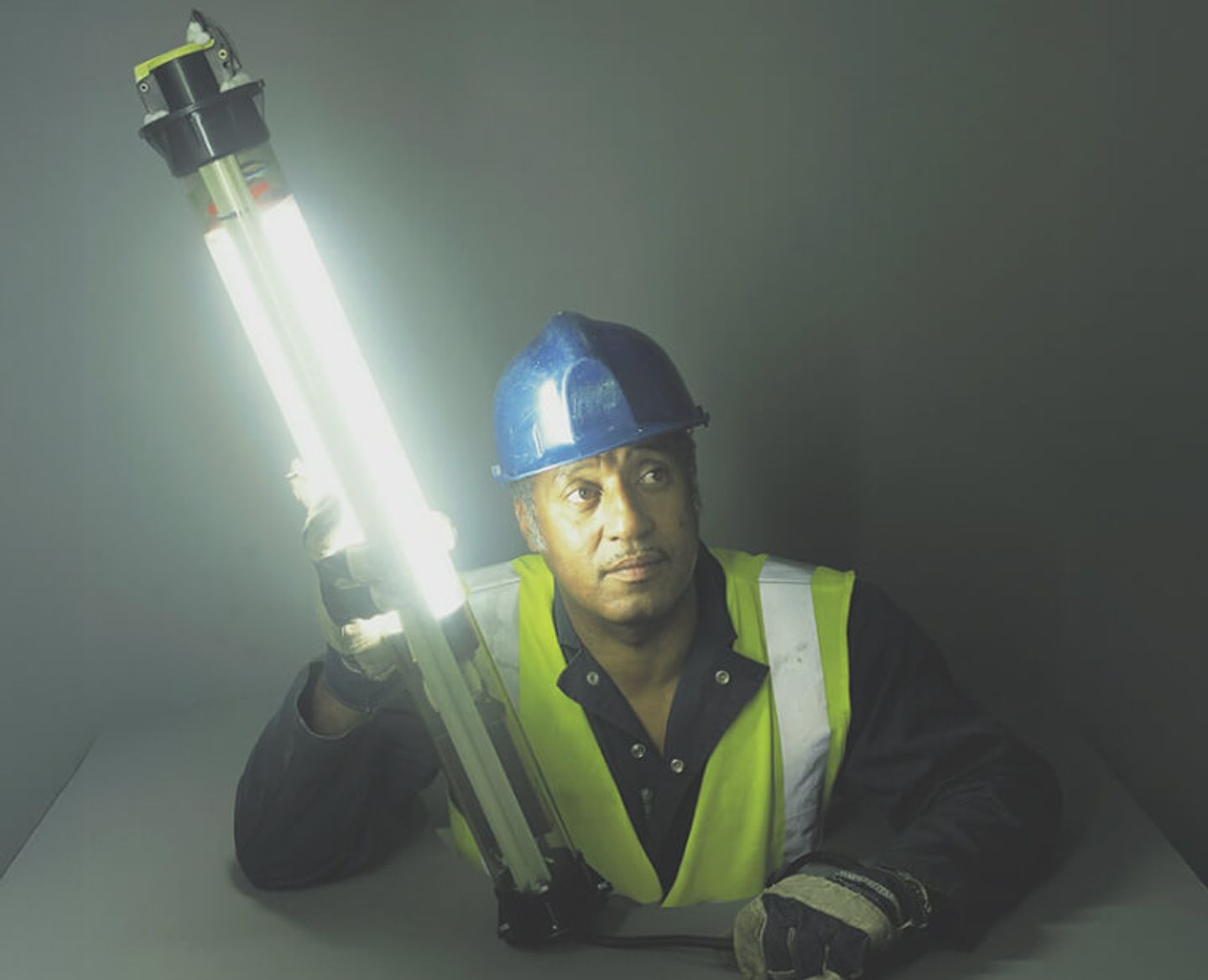man holding led light