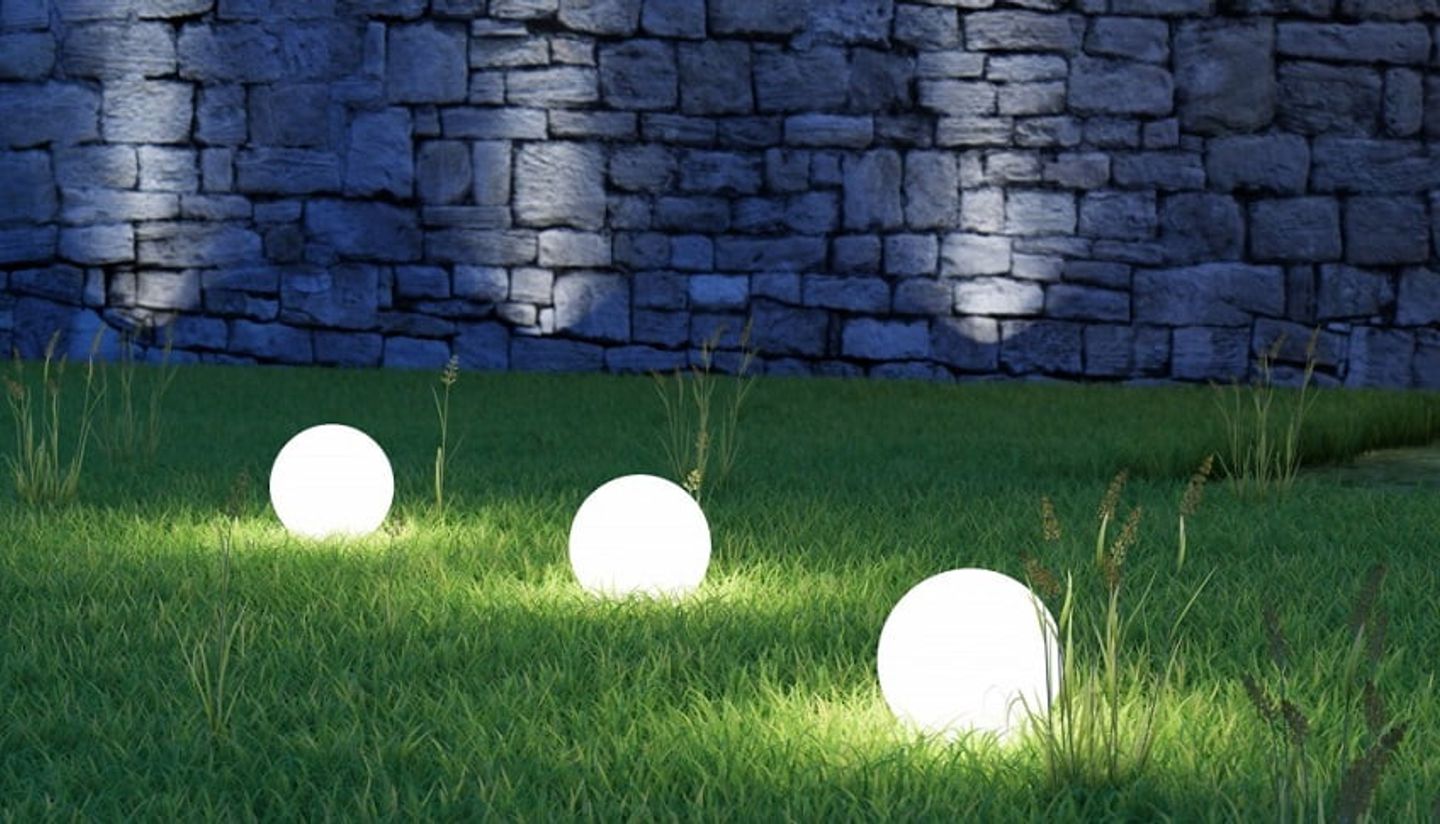 garden globe lights on the grass
